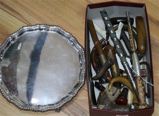 Assorted collectables including plated salver and novelty and other cane handles etc.